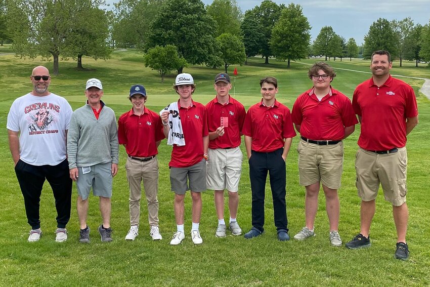 Sacred heart golfers, including state qualifiers&nbsp;Zander Jackson and Luke Jenkins, stand with coaches and scorecards following Friday's Class 1 district tournament held at&nbsp;Schifferdecker Golf Course in Joplin.&nbsp;   PhotoCredit: Photo courtesy of Sacred Heart boys golf