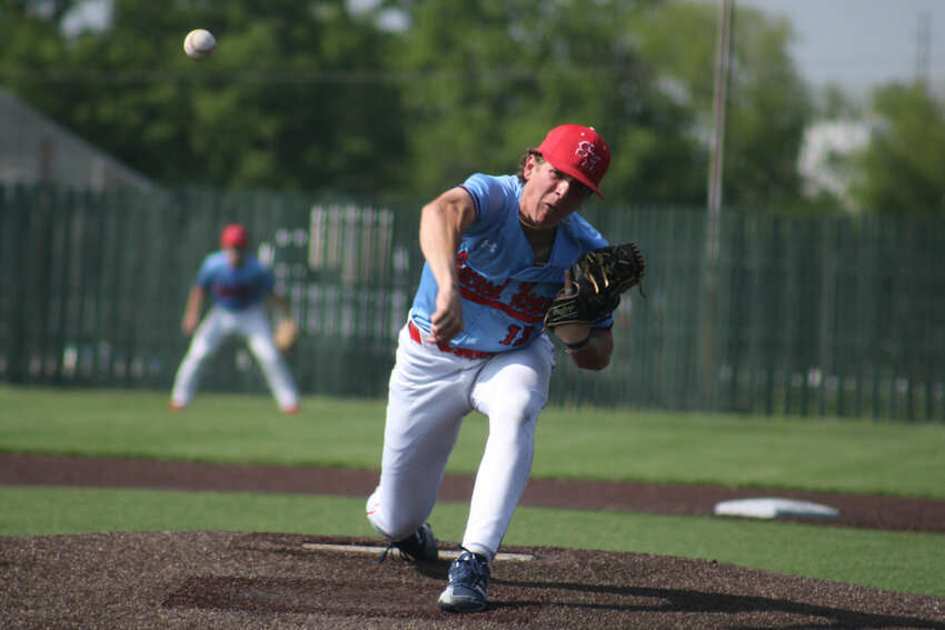 Sacred Heart junior Connor Rice throws a pitch against Leeton in the Class 1 sectional round Monday at Liberty Park Stadium.   PhotoCredit: Photo by Joe Andrews | Star-Journal