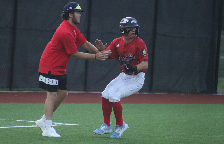 Sedalia Travelers third baseman Avyn Burkhart stops after rounding third base as part of Wednesday's doubleheader in Warrensburg. Post 642 secured a sweep over the Mavericks ahead of a home weekend tournament.   PhotoCredit: Photo by Joe Andrews | Star-Journal