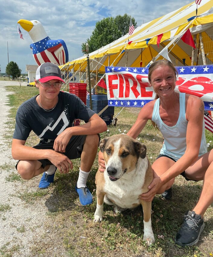 Dylan Butler, Clara Butler and Mona operate Hale's Fireworks on South Limit Avenue just south of the Sedalia city limits. The Butlers stress locking up animals as they tend to run away when fireworks are used.   Photo by Chris Howell | Democrat