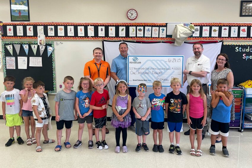 Boys &amp;amp; Girls Clubs of West Central Missouri was recently awarded a $1,000 mini-grant from Simmons Bank to use for its DIY STEM Program. The program engages students in hands-on STEM activities including energy and electricity, engineering design, food chemistry, aeronautics and robotics.   Photo courtesy of Boys &amp;amp; Girls Clubs of West Central Missouri