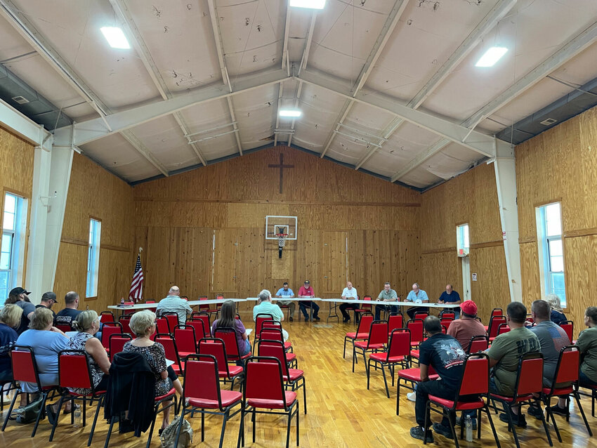 A public information session at the Smithton Community Center Friday floated the idea of the Smithton joining the Pettis County Fire Department. Pettis County Fire Chief explained the benefits to the sparsely-attended audience. Photo by Chris Howell
