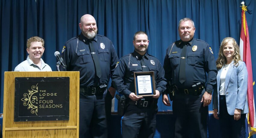 Members of the Sedalia Police DWI unit receive a People Saving People award July 13 at the Law Enforcement Traffic Safety Advisory Council conference. From left, National Highway Safety Traffic Safety Administration Regional Program Manager Aaron Bartlett, Officer Justin Franken, Officer Kyle Schmitt, Chief Matt Wirt, and NHTSA Regional Administrator Susan DeCourcy.   Photo courtesy of Sedalia Police Department