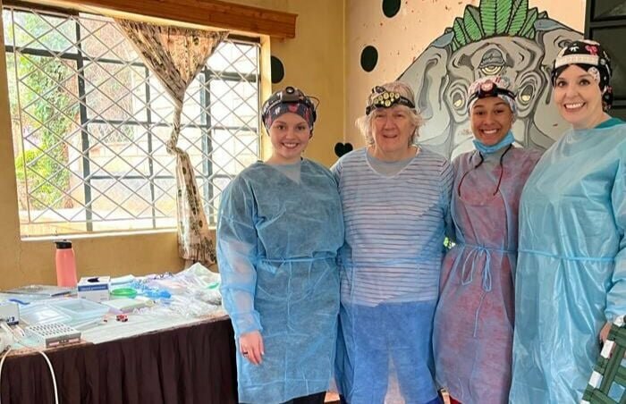 From left, registered dental hygienist student McKenzie Simpson, Susan Eddleman, DDS, Alyssa Hagan, RDH, and Andra Ferguson, RDH, Ph.D., pose for a photo while at the KACH Children's Home in Meru, Kenya.   Photo courtesy of Andra Ferguson