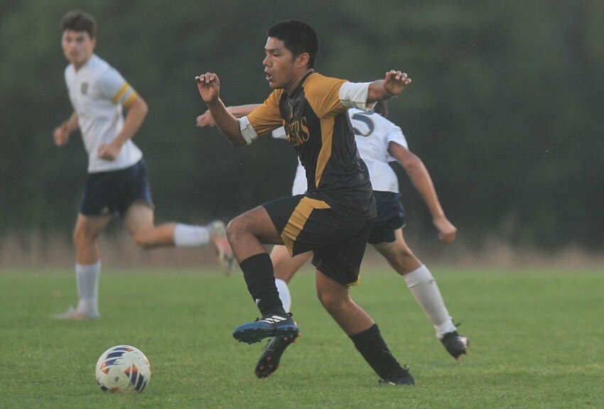 Smith-Cotton's Juan Ubaldo frees himself on the ball in the first half of a match against William Chrisman on Oct. 6, 2022.   PhotoCredit: File photo by Bryan Everson | Democrat