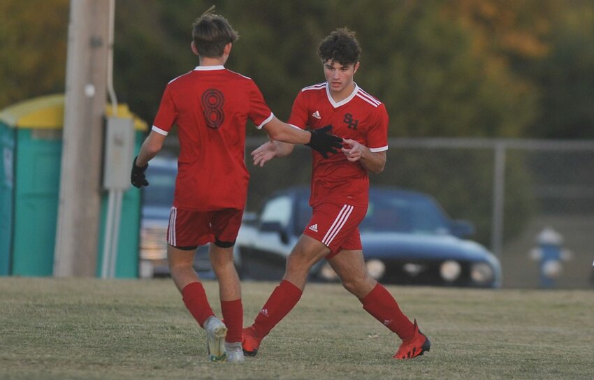 George Bain, right, celebrates with teammate Jackson Manning following a goal in a win over Cole Camp in Sedalia on Oct. 13, 2022. The pair returns along with nine other starters for a Gremlins team expected to be at the top of the Kaysinger Conference and likely in the top-10 class rankings as well.   PhotoCredit: File photo by Bryan Everson | Democrat