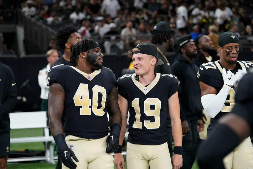 New Orleans Saints linebacker Nick Anderson (40) and place-kicker Blake Grupe (19) talk before an NFL preseason football game against the Houston Texans in New Orleans, Sunday, Aug. 27, 2023.   PhotoCredit: Photo by Gerald Herbert | AP Photo