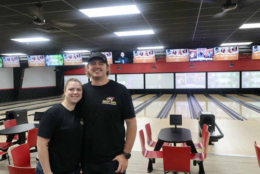 Alley Cats co-owners Miranda and Sterling Wahn stand inside the newly renovated bowling alley on Thursday, Aug. 24. After months of work, the new Warrensburg business opened Aug. 18.   Photo by Meliyah Venerable | Warrensburg Star-Journal