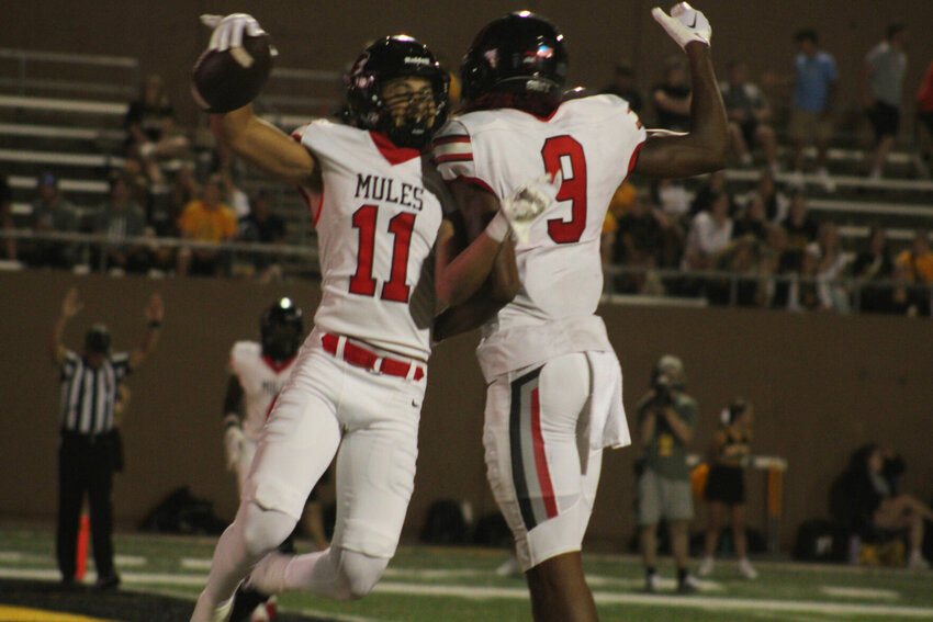 Central Missouri receivers Michael Fitzgerald and Price Morgan celebrate a touchdown against Missouri Western on Thursday, Aug. 31, at Spratt Stadium in St. Joseph.   PhotoCredit: Photo by Joe Andrews | Star-Journal