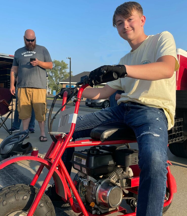 Levi Cordes, of Smithton, awaits his race Thursday, Sept. 7 at the 2023 Pull Start Nationals minibike races at Yeager's Cycle in Sedalia.   Photo by Chris Howell | Democrat