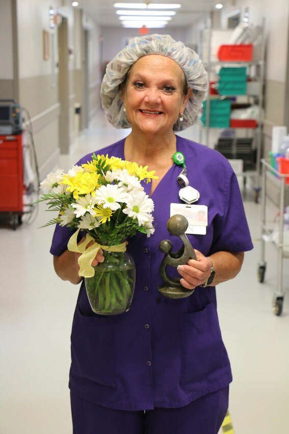 Donna Cline, an RN in Same Day Surgery at Bothwell Regional Health Center, recently received the prestigious DAISY Award for Extraordinary Nurses. Cline was nominated for the award by fellow RN Margaret Benson.   Photo courtesy of Bothwell Regional Health Center