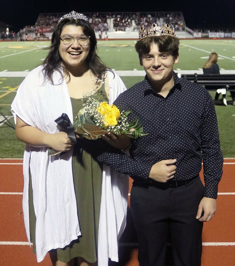 At halftime of the Smith-Cotton football game against Warrensburg High on Friday, Sept. 8, senior Dakota Acosta, left, was named activities queen and senior Alex Rice was crowned activities king. Princess, not shown, was Skyler Green. Acosta was nominated from Team SCREAM, the Smith-Cotton robotics program. Rice was nominated by the Math Club. Student votes determined the winners.   Photo courtesy of Sedalia School District 200
