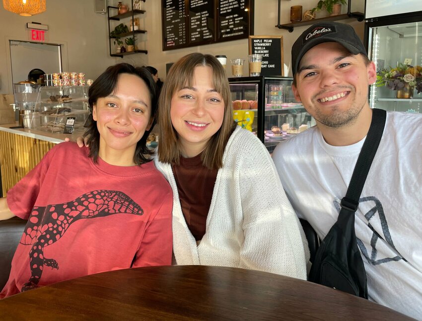 Anne Moffat from Melbourne, Australia, came to Sedalia knowing no one and quickly met Olya and Mark Melnik at Teremok Coffee &amp;amp; Desserts. The Melniks invited Moffat to profile their home church community.   Photo by Chris Howell | Democrat