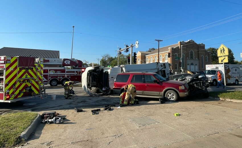 A City of Sedalia garbage truck was hit by a Chevy Tahoe at South Engineer Avenue and East Broadway Boulevard on Friday morning, Sept. 29. Five people were injured with two flown out in serious condition.   Photo by Chris Howell | Democrat