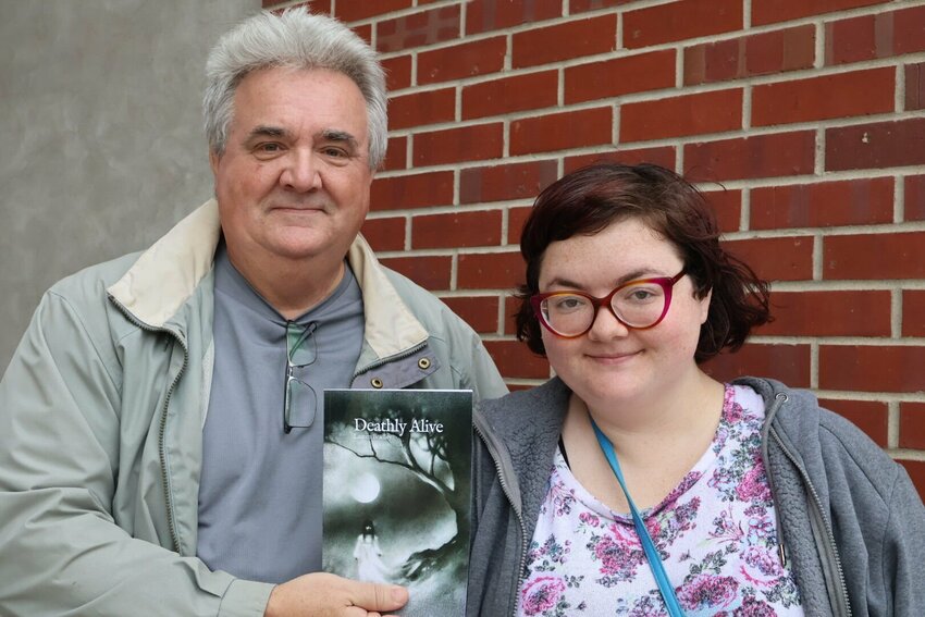 Bradley Vann and his daughter Lauren Vann, also known by their collective pen name, Lauren Bradley, have published their first book.   Photo by Meliyah Venerable | Warrensburg Star-Journal