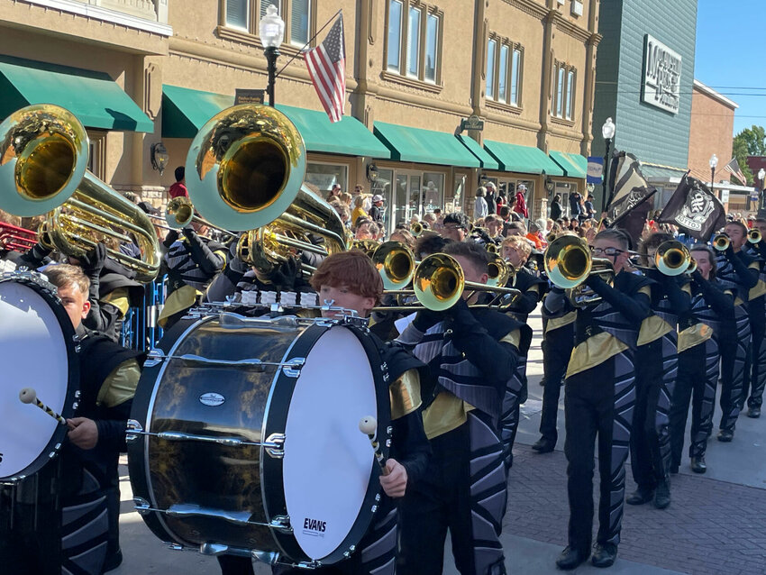 Members of the Smith-Cotton Tiger Marching Band blare their horns down South Ohio Avenue as the crowd enjoys the festivities for the Smith-Cotton High School Homecoming Parade on Friday afternoon, Oct. 13 in downtown Sedalia.&nbsp;   Photo by Chris Howell | Democrat