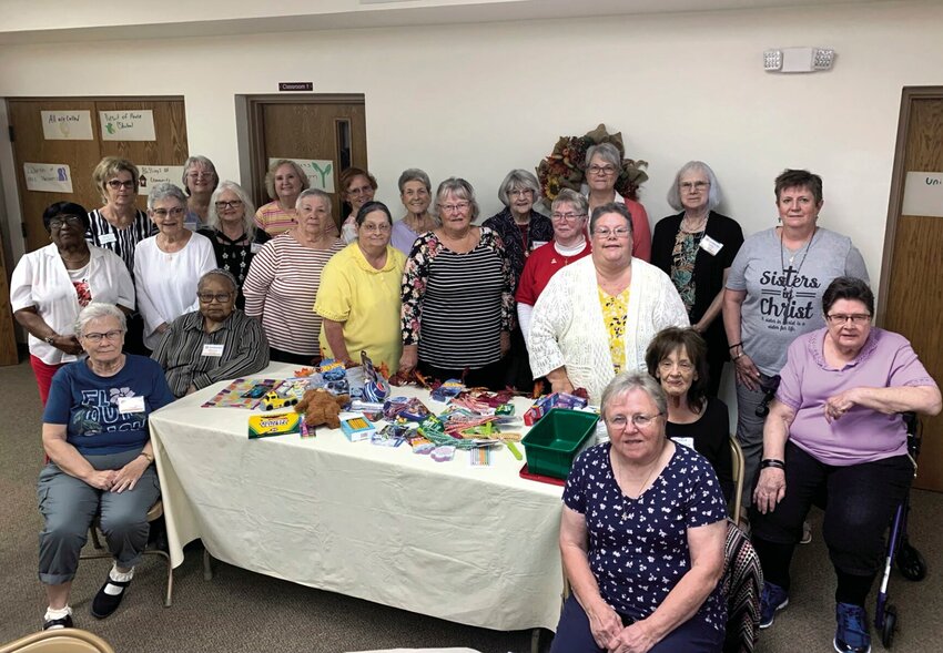 Members of Church Women United are pictured with &ldquo;Shoe Box&rdquo; items that are being donated for Christmas Boxes to be sent to children locally and around the world through &ldquo;Samaritans Purse,&rdquo; Christmas Child.   Photo courtesy of Church Women United