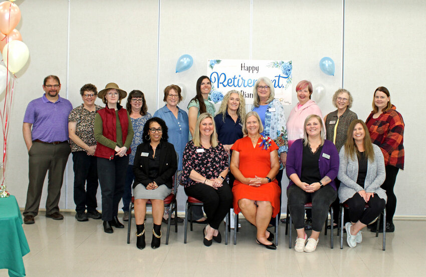 Executive Director Diana Hoemann poses for a photo with Care Connection employees during her retirement reception hosted Wednesday afternoon, Oct. 25 at the Warrensburg Senior Center.   Photo courtesy of Care Connection