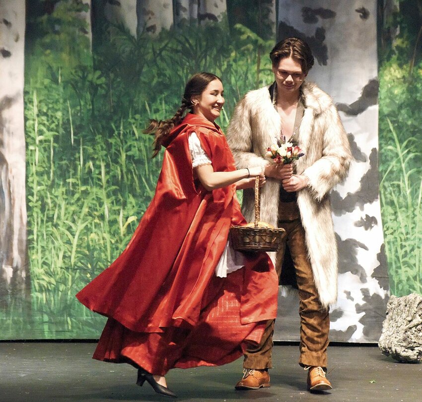 Monday night, Nov. 13 during a dress rehearsal for the Smith-Cotton High School musical &ldquo;Into the Woods,&rdquo; Little Red Riding Hood (Maddision Sherwood) unfortunately meets the Big Bad Wolf (Harrison Ray) while skipping through the woods. &ldquo;Into the Woods&rdquo; will be presented Nov. 17-19 at the Heckart Performing Arts Center, 2010 Tiger Pride Blvd.   Photo by Faith Bemiss-McKinney | Democrat