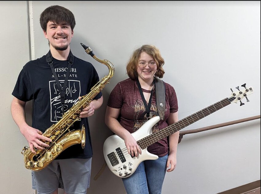 Two Smith-Cotton High School musicians earned spots on the West Central MMEA district jazz band in auditions held Saturday, Nov. 11, in Warrensburg. Holden Fox, left, is second chair tenor saxophone (also placed second on baritone saxophone), and Patience McGinnis is first chair bass.   Photo courtesy of Sedalia School District 200   &nbsp;