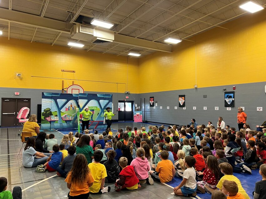 Superhero characters with Delta Dental of Missouri&rsquo;s Land of Smiles dental education program talk about good dental habits during a recent visit to Skyline Elementary.   Photo courtesy of Delta Dental of Missouri