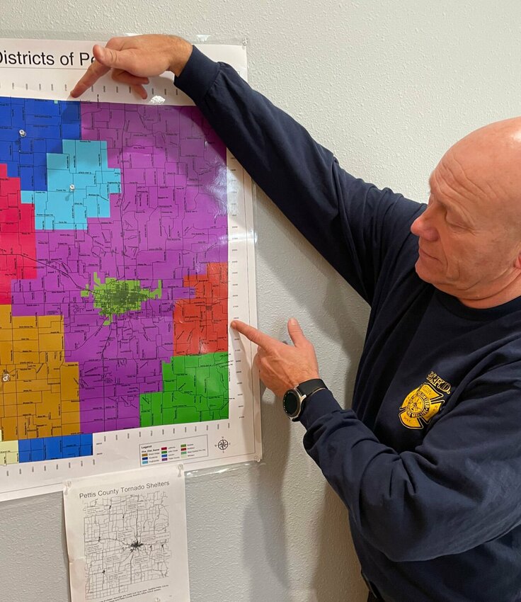 Pettis County Fire Chief Mike Harding points out the two newest areas his crews protect: Houstonia and Smithton. Harding will be training a class of 21 new firefighters starting in January.   Photo by Chris Howell | Democrat