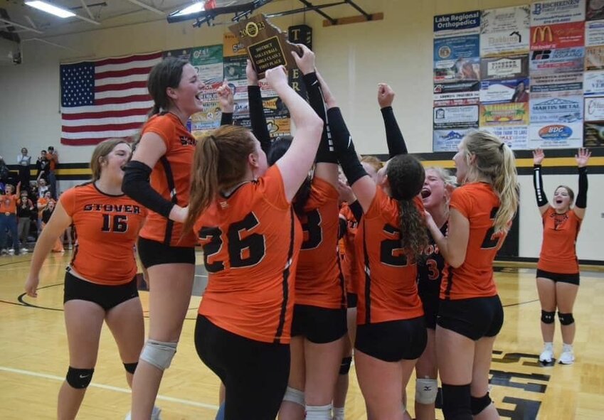 Stover celebrates its district championship victory Saturday afternoon against host Versailles. The Lady Bulldogs look to continue their postseason success at home Thursday against Houston.   PhotoCredit: Photo courtesy of Stover Lady Bulldogs