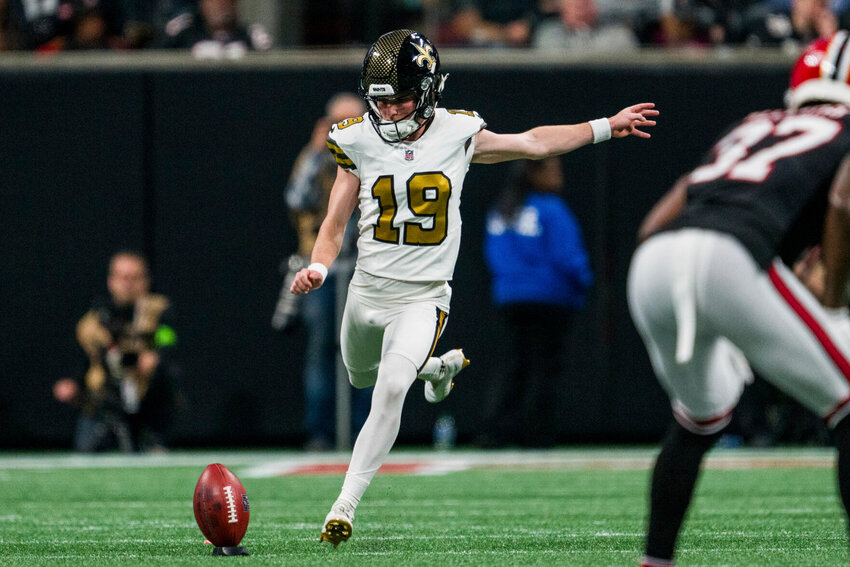 New Orleans Saints place kicker Blake Grupe (19) kicks off during the first half of an NFL football game against the Atlanta Falcons, Sunday, Nov. 26, 2023, in Atlanta. The Atlanta Falcons won 24-15.   PhotoCredit: Photo by Danny Karnik | AP Photo