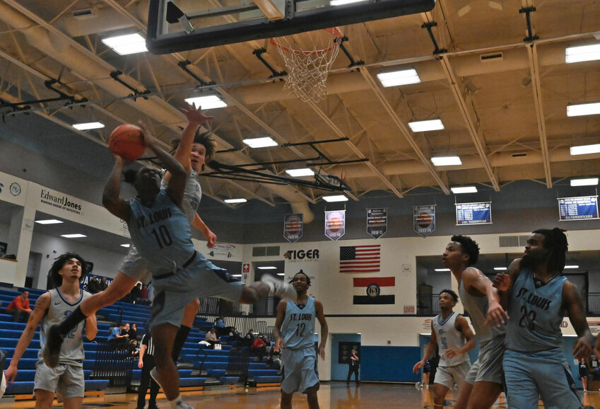 State Fair Community College forward Isaiah Jackson contests a shot in the second half of Wednesday night's defeat against St. Louis Community College.   PhotoCredit: Photo by Bryan Everson | Democrat