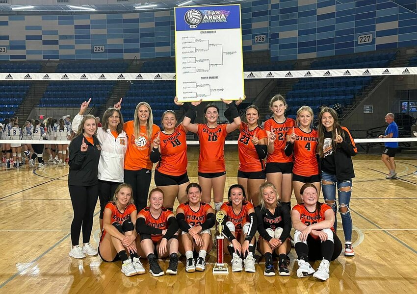 The Stover Lady Bulldogs show off their first-place silverware, as well as the bracket from last weekend's HyVee Arena Invitational in Kansas City.   PhotoCredit: Photo courtesy of Stover Lady Bulldogs Volleyball