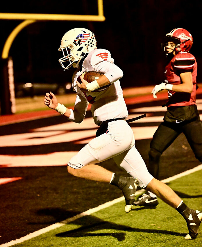 Tipton quarterback Cain Myers gets into the end zone for a first-half touchdown Friday night in Crystal City. The Cardinals were defeated by the Hornets, 8-6.   PhotoCredit: Photo courtesy of Steve Garber