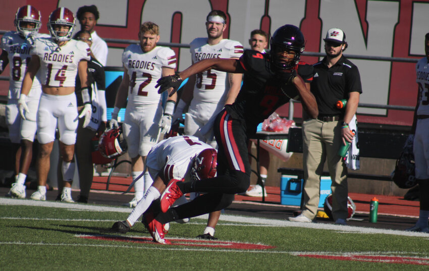 Central Missouri redshirt sophomore Michael Fitzgerald II breaks free following a reception against Henderson State in the NCAA Division II Super Region 3 quarterfinal round Saturday, Nov. 18, at Walton Stadium.   PhotoCredit: Photo by Joe Andrews | Star-Journal