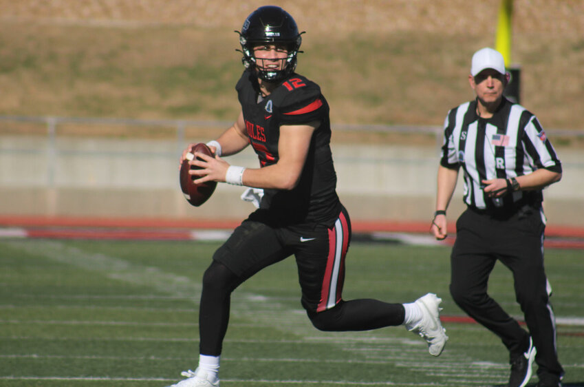 Cetral Missouri redshirt junior quarterback Zach Zebrowski runs around the pocket against Henderson State in the NCAA Divison II Super Region 3 quarterfinal round Saturday, Nov. 18, at Walton Stadium.   PhotoCredit: Photo by Joe Andrews | Star-Journal