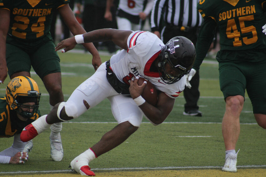 Central Missouri sophomore running back Marcellous Hawkins dives into the endzone for a touchdown against Missouri Southern on Saturday, Oct. 28, at Fred G. Hughes Stadium in Joplin.   PhotoCredit: Photo by Joe Andrews | Star-Journal