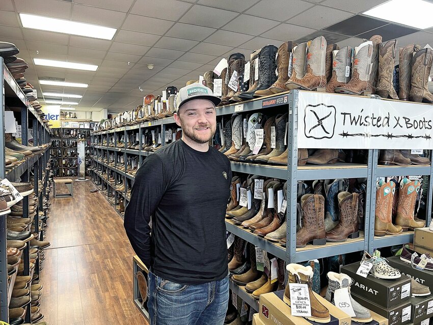 Kyle Bean, owner of Gene's Boots &amp;amp; Hats, moved the store to its new location Wednesday night, Dec. 6. He noted the store will open for business at 9 a.m. Thursday, Dec. 7, at its new location, 3114 W. Broadway Blvd.   Photo by Faith Bemiss-McKinney | Democrat
