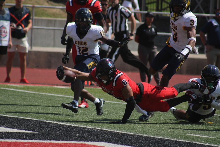 Central Missouri redshirt senior Arkell Smith dives into the endzone for a touchdown against Central Oklahoma on Saturday, Sept. 9, at Walton Stadium.   PhotoCredit: Photo by Joe Andrews | Star-Journal