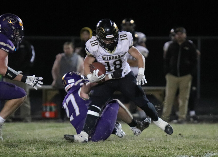 North Platte's Chance Garber tries to bring down Windsor running back Parker Craig in Friday's Class 1 district championship game in Dearborn.   PhotoCredit: Photo by&nbsp;Tanner Cobb | Platte County Citizen