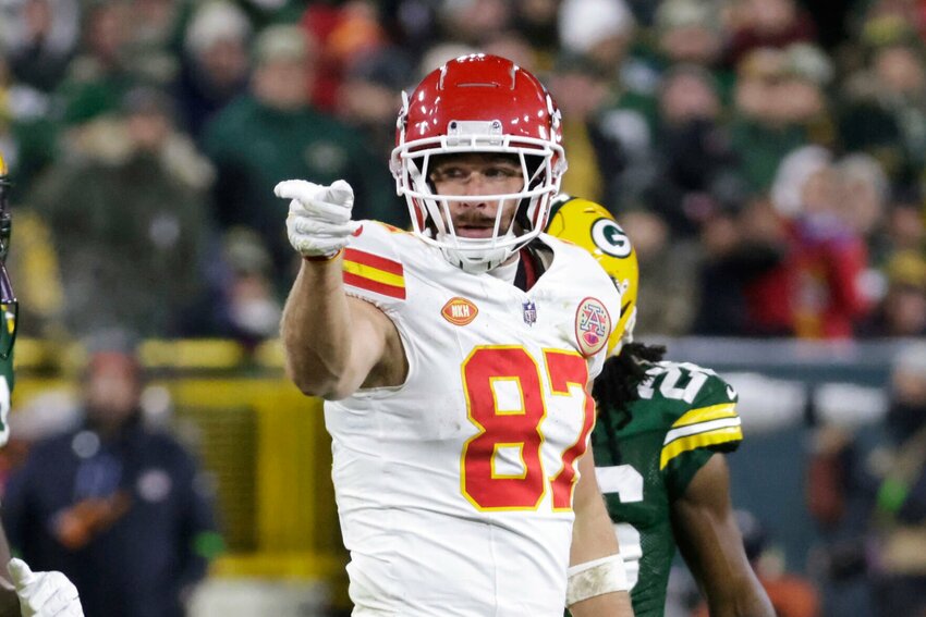 Kansas City Chiefs tight end Travis Kelce (87) signals a first down against the Green Bay Packers during the first half of an NFL football game Sunday, Dec. 3, 2023 in Green Bay, Wis.   PhotoCredit: Photo by Mike Roemer | AP Photo
