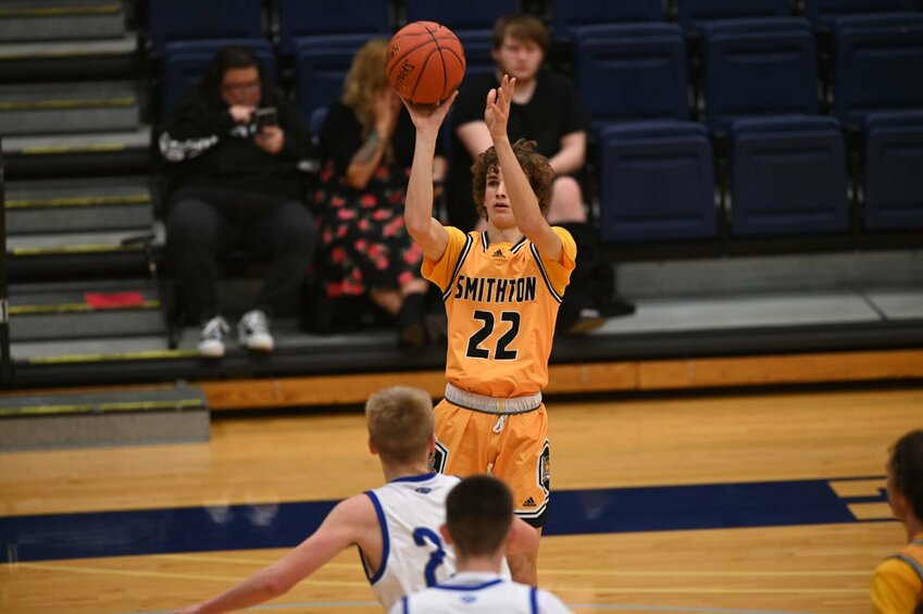 Smithton's Sam Bray shoots from the perimeter in a W-K Holiday Shootout overtime victory against Climax Springs on Friday, Dec. 15.&nbsp;   PhotoCredit: Photo by Bryan Everson | Democrat