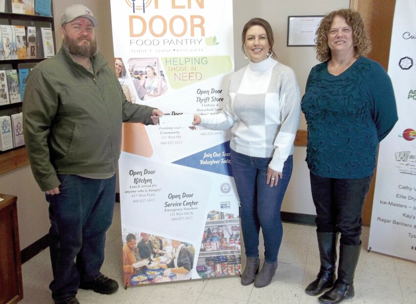 Immanuel United Church of Christ recently donated $2,200 to Open Door for the Souper Bowl Soup Drive. Pictured from left are William Gerlt from Immanuel Church, Open Door Executive Director Amanda Davis and Open Door Director of Development Michelle O'Donnell.   Photo courtesy of Phillip Gerlt