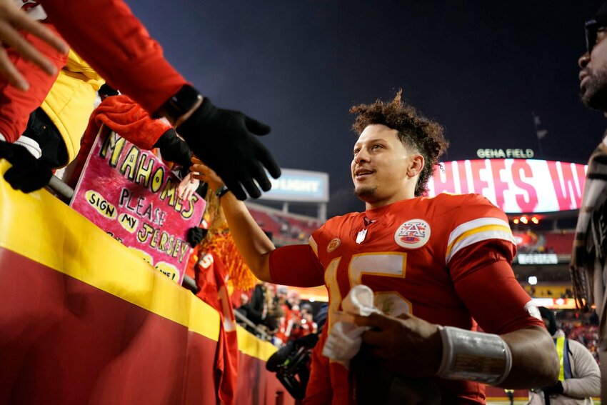Kansas City Chiefs quarterback Patrick Mahomes celebrates following an NFL football game against the Cincinnati Bengals Sunday, Dec. 31, 2023, in Kansas City, Mo. The Chiefs won 25-17 to clinch the AFC West.   PhotoCredit: Photo by Charlie Riedel | AP Photo