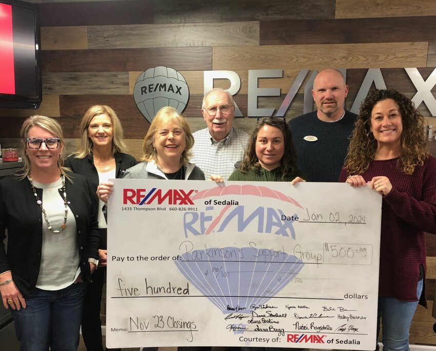 RE/MAX of Sedalia recently donated $500 to the Parkinson's Support Group through its Heart of Sedalia Foundation. Each month, the agents donate a portion of their earnings from every transaction to help support various local charities.&nbsp;   Photo courtesy of RE/MAX of Sedalia