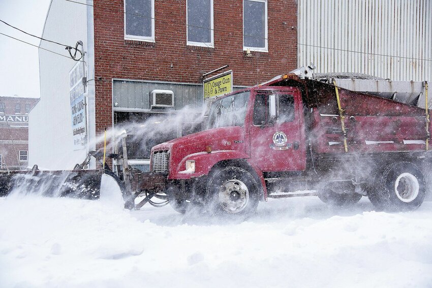 A City of Sedalia snowplow clears Main Street near Osage Avenue on Wednesday morning, Feb. 2, 2022, during a winter snowstorm.   File photo by Faith Bemiss-McKinney | Democrat