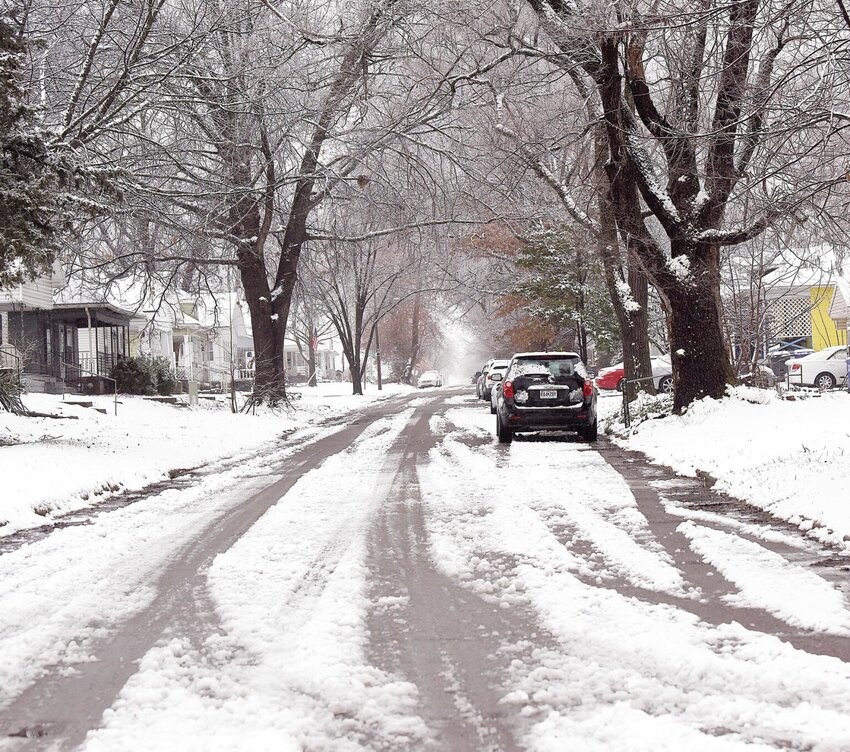 Many of Sedalia&rsquo;s main thoroughfares were cleared of snow Tuesday morning, although side streets, such as this street at 11th Street and Hancock Avenue, remained covered at 8:30 a.m.   Photo by Faith Bemiss-McKinney | Democrat
