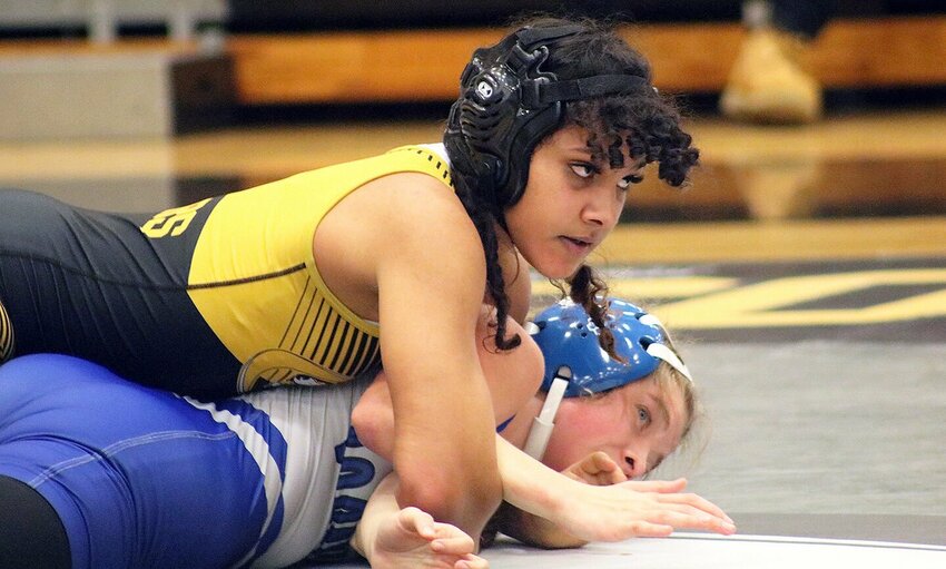 Smith-Cotton junior Jazlyn Smith-Freeman controls Alivia Bottoms of Boonville in their 120-pound matchup Thursday, Jan. 11, in the S-C gym. Smith-Freeman won 8-2 for her 100th career win.   PhotoCredit: Photo courtesy of Sedalia School District 200