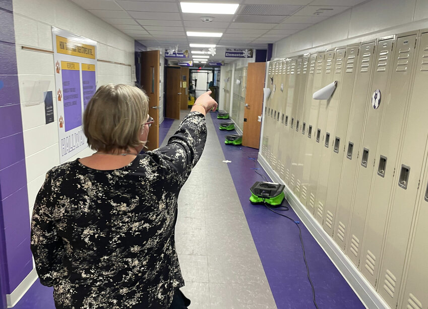 Green Ridge R-12 dries out after thousands of gallons of water flooded the school overnight Monday, Jan. 15. History teacher Missy Hammerscheid tours the damage Thursday, Jan. 18.   Photo by Chris Howell | Democrat