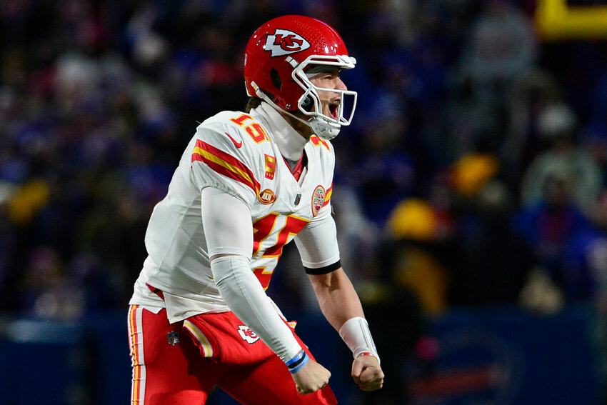 Kansas City Chiefs quarterback Patrick Mahomes (15) reacts after beating the Buffalo Bills in an NFL AFC division playoff football game, Sunday, Jan. 21, 2024, in Orchard Park, N.Y.   PhotoCredit: Photo by Adrian Kraus | AP Photo