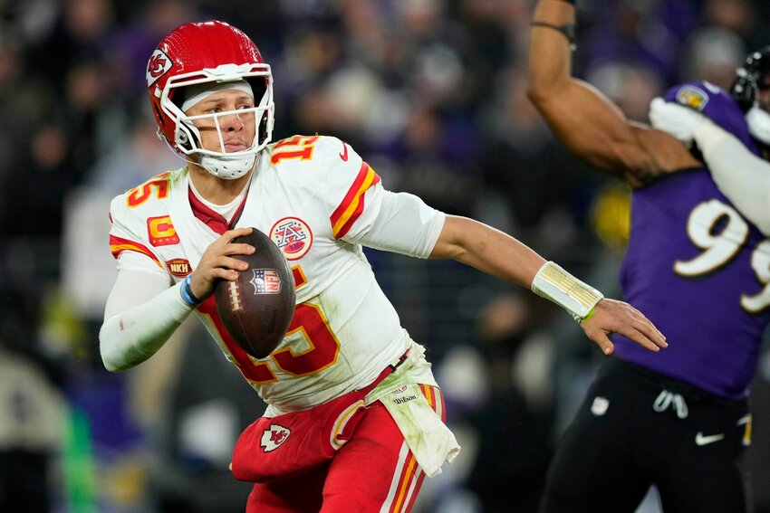 Kansas City Chiefs quarterback Patrick Mahomes (15) looks to pass during the second half of the AFC Championship NFL football game against the Baltimore Ravens, Sunday, Jan. 28, 2024, in Baltimore.   PhotoCredit: Photo by Matt Slocum | AP Photo