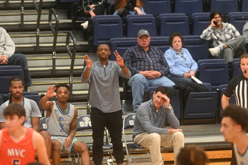 State Fair Community College men's basketball assistant coach Deshon Portley signals to the team during its game against Missouri Valley College JV on Nov. 1, 2023.   PhotoCredit: Photo by Bryan Everson | Democrat