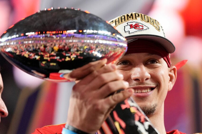 Kansas City Chiefs quarterback Patrick Mahomes holds the Vince Lombardi Trophy after the NFL Super Bowl 58 football game against the San Francisco 49ers on Sunday, Feb. 11, 2024, in Las Vegas. The Chiefs won 25-22.   PhotoCredit: Photo by Ashley Landis | AP Photo